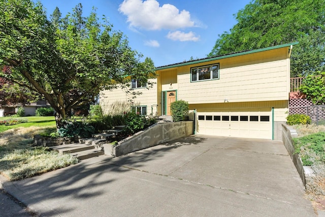 3832 S Cook St, Spokane, WA 99223 - bi-level home featuring an attached garage and driveway