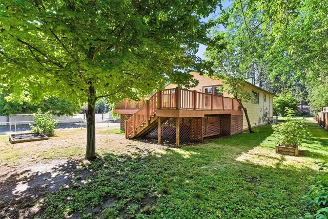3832 S Cook St, Spokane, WA 99223 - view of yard with a garden, stairway, and a deck