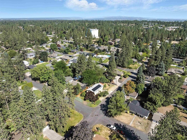 3832 S Cook St, Spokane, WA 99223 - aerial view of property and surrounding area featuring a heavily wooded area and nearby suburban area