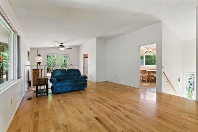 3832 S Cook St, Spokane, WA 99223 - living area featuring ceiling fan, light wood finished floors, and healthy amount of natural light