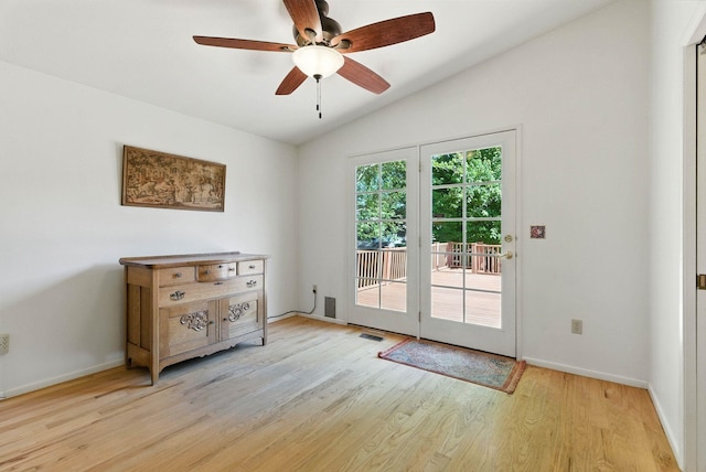3832 S Cook St, Spokane, WA 99223 - doorway featuring vaulted ceiling, light wood-style floors, and a ceiling fan