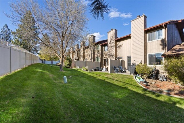 3714 S Alder Cir, Spokane, WA 99223 - fenced backyard featuring a patio area