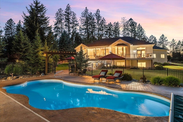 5614 N Thierman Rd, Spokane, WA 99217 - pool at dusk featuring a patio area