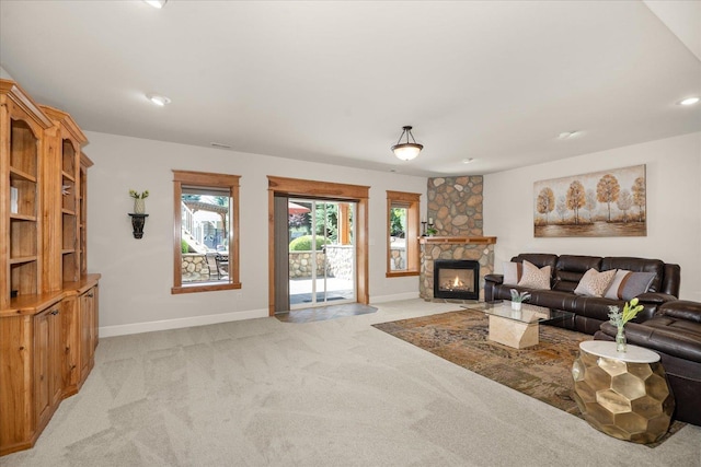 5614 N Thierman Rd, Spokane, WA 99217 - living room with light carpet, a fireplace, and recessed lighting