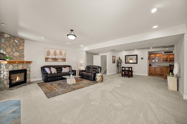 5614 N Thierman Rd, Spokane, WA 99217 - living room featuring carpet flooring, a fireplace, recessed lighting, and bar
