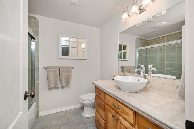 5614 N Thierman Rd, Spokane, WA 99217 - bathroom featuring vanity, combined bath / shower with glass door, and tile patterned floors