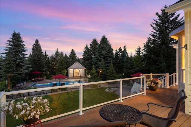 5614 N Thierman Rd, Spokane, WA 99217 - wooden deck featuring a lawn and an outbuilding