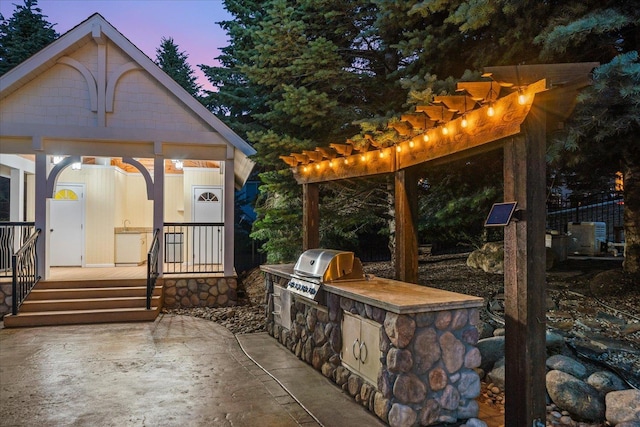 5614 N Thierman Rd, Spokane, WA 99217 - view of patio / terrace with an outdoor kitchen and a pergola