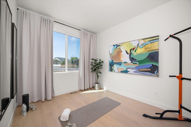 5257 S Falcon Point Ct, Spokane, WA 99224 - exercise room with wood finished floors and baseboards