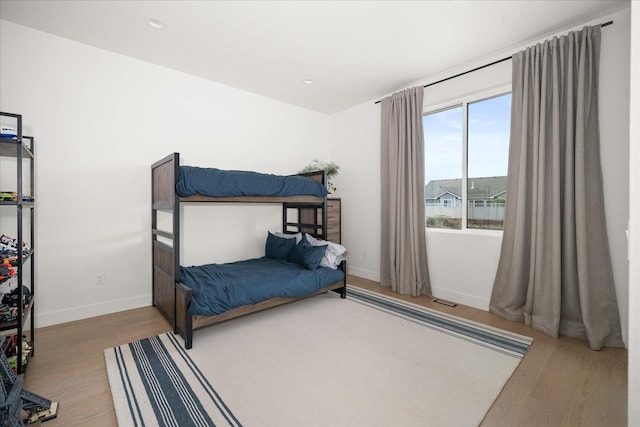 5257 S Falcon Point Ct, Spokane, WA 99224 - bedroom featuring wood finished floors and baseboards