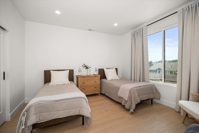 5257 S Falcon Point Ct, Spokane, WA 99224 - bedroom featuring light wood-style flooring and recessed lighting