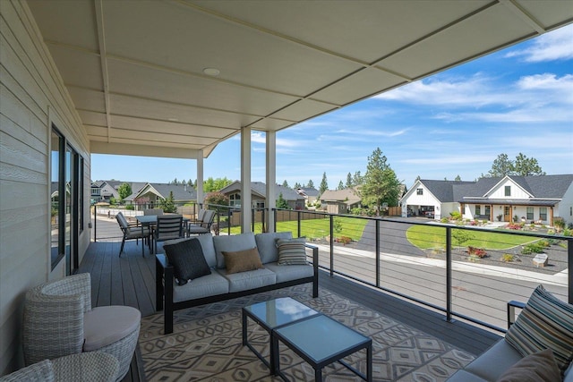 5257 S Falcon Point Ct, Spokane, WA 99224 - balcony featuring a residential view, outdoor dining space, and outdoor lounge area