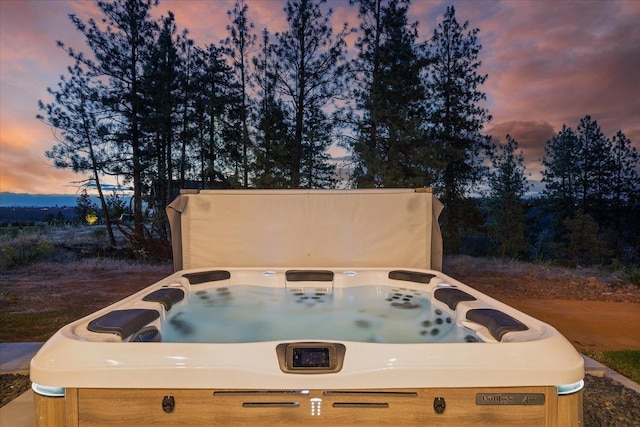 5257 S Falcon Point Ct, Spokane, WA 99224 - patio terrace at dusk with a hot tub