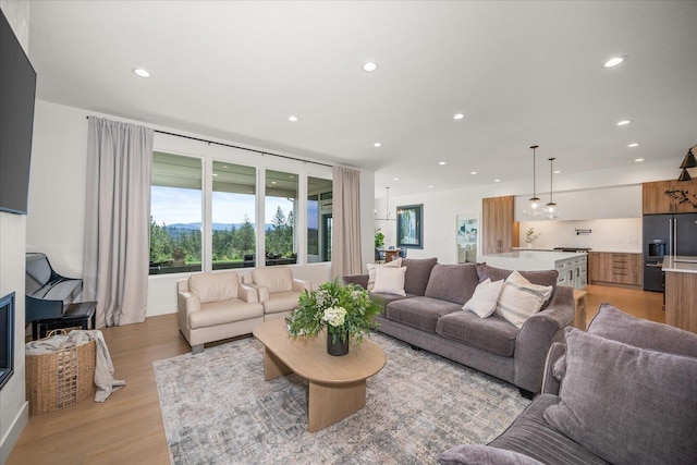 5257 S Falcon Point Ct, Spokane, WA 99224 - living room featuring recessed lighting and light wood-style flooring