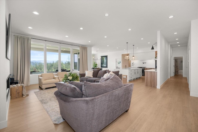 5257 S Falcon Point Ct, Spokane, WA 99224 - living room with light wood finished floors and recessed lighting