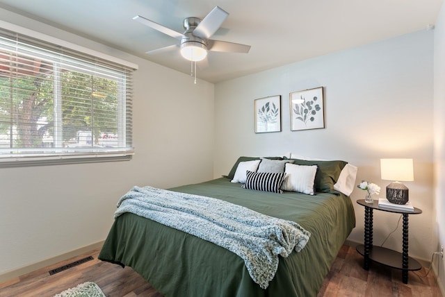 12911 E Desmet Ave, Spokane, WA 99216 - bedroom featuring wood finished floors and ceiling fan