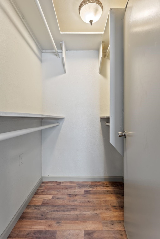 12911 E Desmet Ave, Spokane, WA 99216 - spacious closet featuring wood finished floors