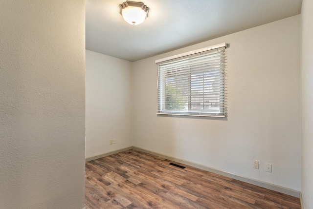 12911 E Desmet Ave, Spokane, WA 99216 - spare room with wood finished floors