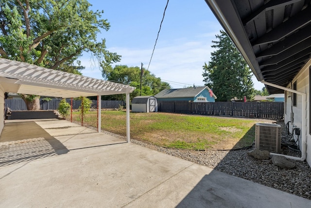 12911 E Desmet Ave, Spokane, WA 99216 - fenced backyard with a shed, a patio, and concrete driveway