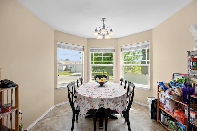 1720 W Briar Ln, Spokane, WA 99208 - dining room featuring a chandelier and plenty of natural light