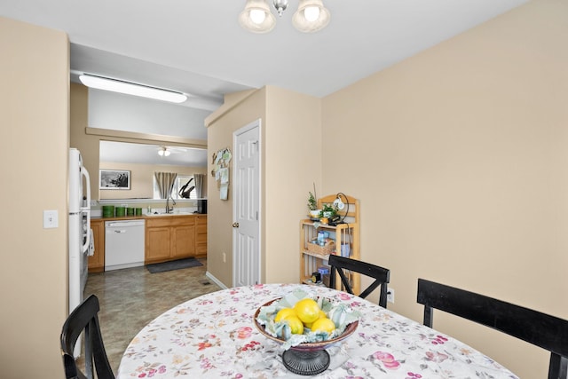 1720 W Briar Ln, Spokane, WA 99208 - dining area featuring baseboards and a chandelier