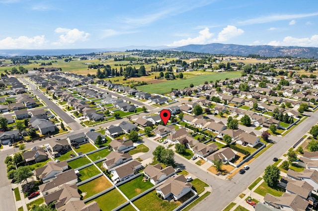 1720 W Briar Ln, Spokane, WA 99208 - aerial view of property's location with a mountainous background and nearby suburban area
