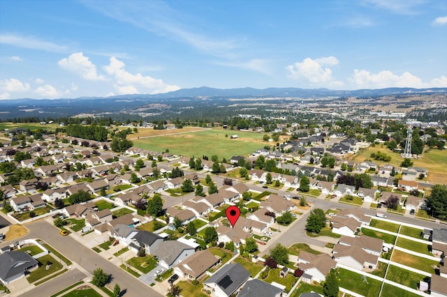 1720 W Briar Ln, Spokane, WA 99208 - aerial overview of property's location featuring a mountainous background