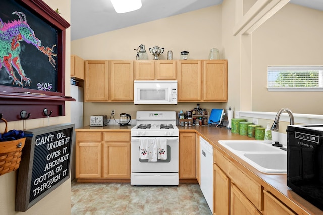 1720 W Briar Ln, Spokane, WA 99208 - kitchen with white appliances, vaulted ceiling, light brown cabinets, and light countertops