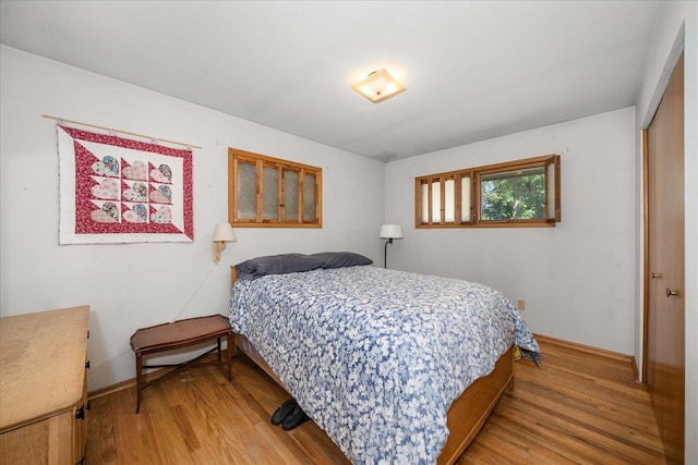 11322 E 18th Ave, Spokane, WA 99206 - bedroom featuring light wood-type flooring and baseboards