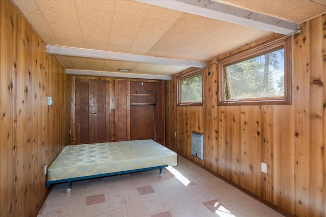 11322 E 18th Ave, Spokane, WA 99206 - bedroom with wooden walls and tile patterned floors