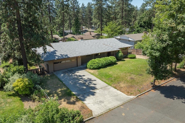 11322 E 18th Ave, Spokane, WA 99206 - view of front of home with a garage and concrete driveway