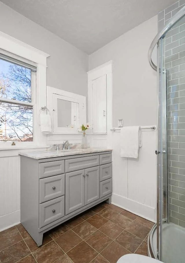 1518 W 6th Ave, Spokane, WA 99204 - full bathroom featuring vanity and a stall shower