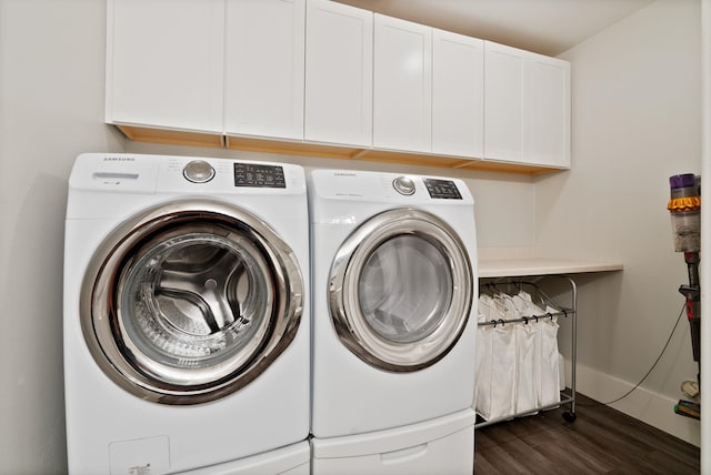 1611 W Tieton Ave, Spokane, WA 99208 - laundry room with washing machine and clothes dryer, cabinet space, and dark wood-style floors