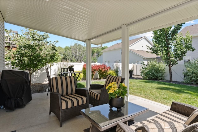 1611 W Tieton Ave, Spokane, WA 99208 - fenced backyard featuring a patio area, grilling area, and outdoor lounge area