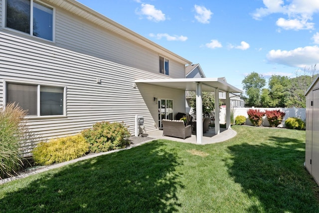 1611 W Tieton Ave, Spokane, WA 99208 - rear view of property with a patio and an outdoor hangout area