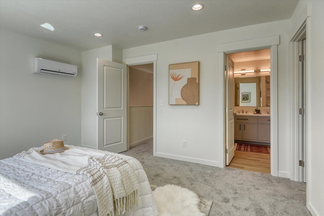 4907 E 6th Avenue 4909E 6Th Ave, Spokane Valley, WA 99212 - bedroom featuring an AC wall unit, light carpet, recessed lighting, and connected bathroom