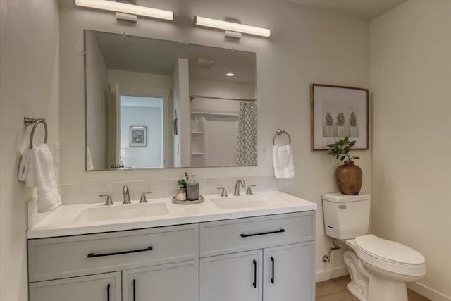 4907 E 6th Avenue 4909E 6Th Ave, Spokane Valley, WA 99212 - full bathroom featuring double vanity, wood finished floors, and curtained shower