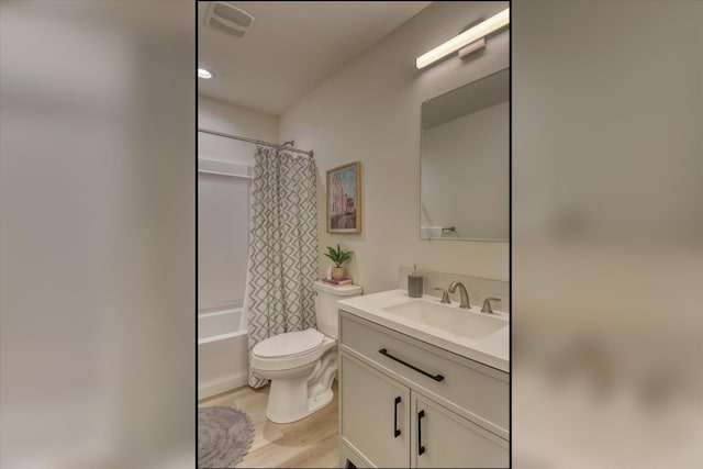 4907 E 6th Avenue 4909E 6Th Ave, Spokane Valley, WA 99212 - full bath featuring vanity, wood finished floors, and shower / bath combination with curtain
