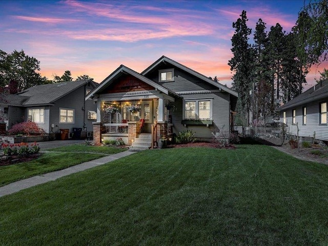 19 E 28th Ave, Spokane, WA 99203 - view of front facade with a lawn and covered porch