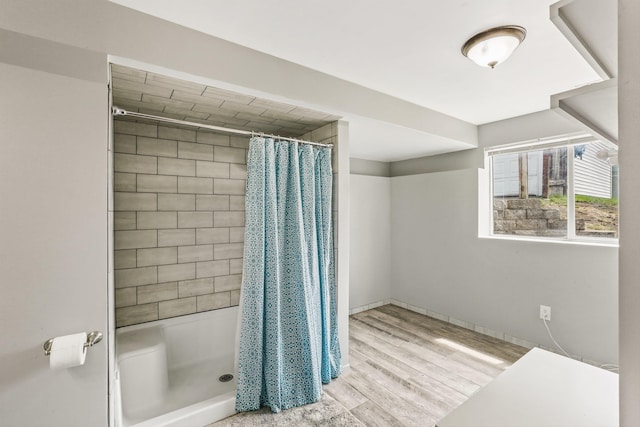 9906 E 17th Ln, Spokane Valley, WA 99206 - full bathroom featuring a stall shower and wood finished floors