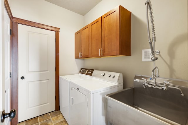 16319 E Whirlaway Ln, Veradale, WA 99037 - washroom with washer and dryer and cabinet space