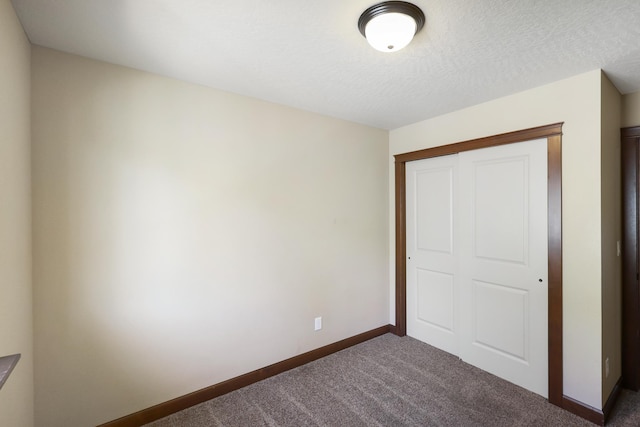 16319 E Whirlaway Ln, Veradale, WA 99037 - unfurnished bedroom featuring carpet floors and a closet