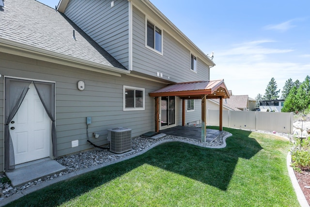 16319 E Whirlaway Ln, Veradale, WA 99037 - back of house featuring a patio and roof with shingles