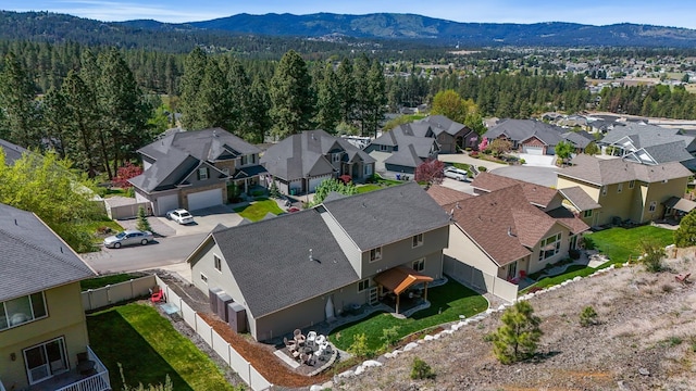 16319 E Whirlaway Ln, Veradale, WA 99037 - aerial view of residential area with mountains and a heavily wooded area
