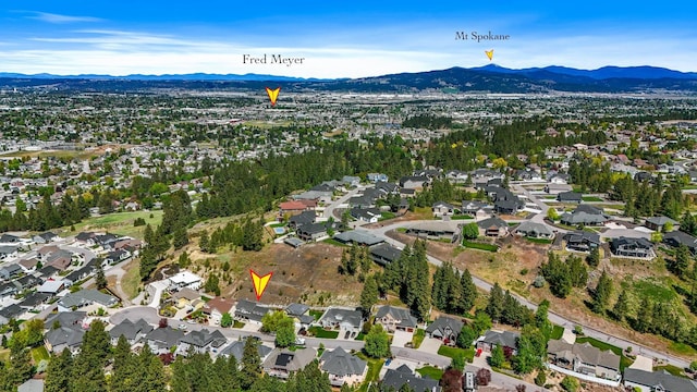 16319 E Whirlaway Ln, Veradale, WA 99037 - aerial overview of property's location with a mountainous background and nearby suburban area