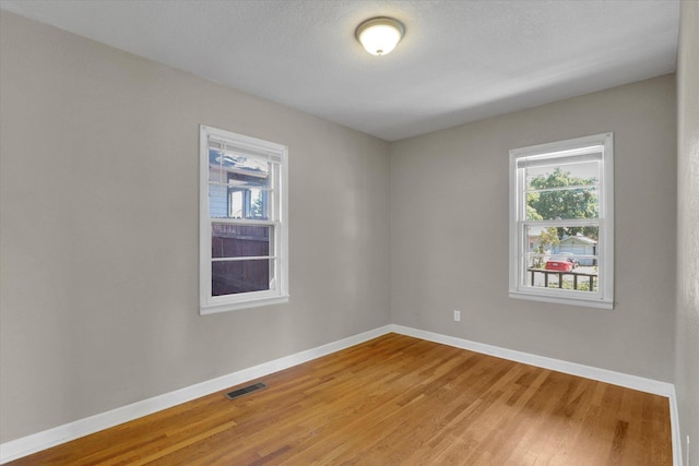 1728 W Spofford Ave, Spokane, WA 99205 - unfurnished room featuring baseboards and light wood finished floors