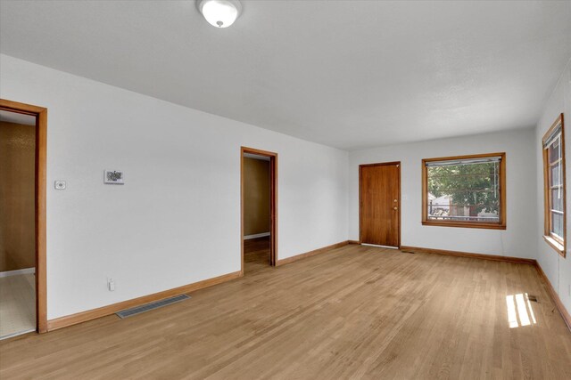 1728 W Spofford Ave, Spokane, WA 99205 - unfurnished room with light wood-style floors and baseboards