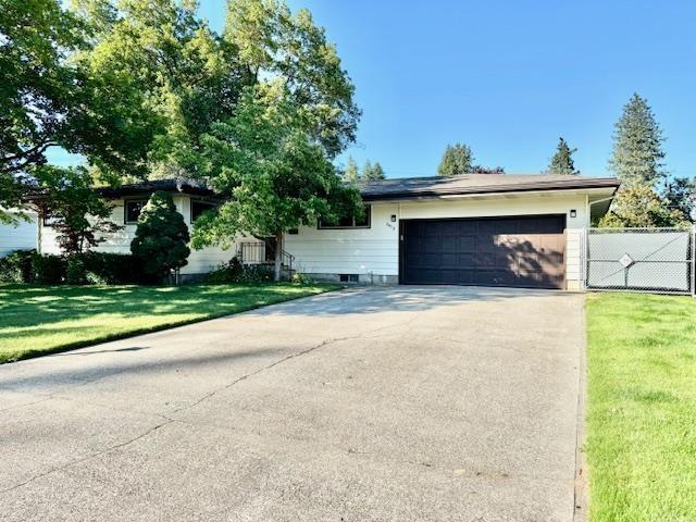 6412 N Fotheringham St, Spokane, WA 99208 - view of front facade with an attached garage and concrete driveway