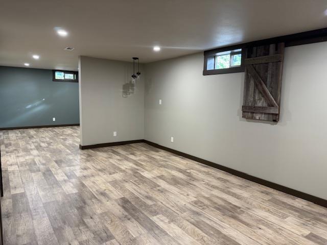 6412 N Fotheringham St, Spokane, WA 99208 - basement with wood finished floors, plenty of natural light, and recessed lighting