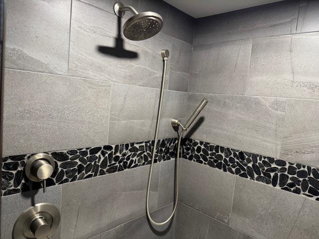 6412 N Fotheringham St, Spokane, WA 99208 - bathroom view of a tile shower and pet washing station